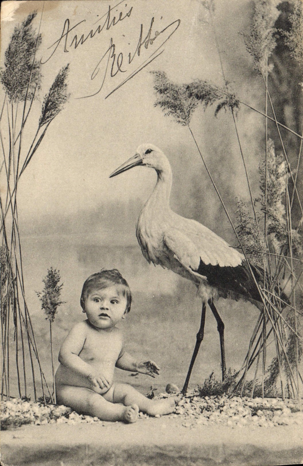 CPA Fantaisie Enfant Cigogne