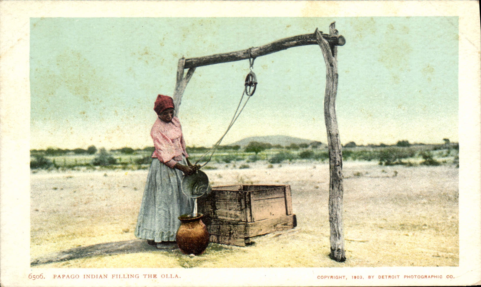 VINTAGE POSTCARD Indian Papago indian filling the Olla