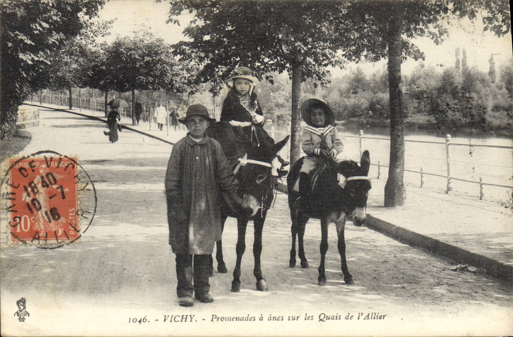 VINTAGE POSTCARD Ane Mule Vichy Promenade has asses on the quays of Allier