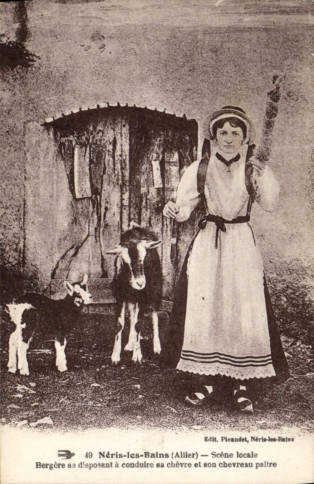 VINTAGE POSTCARD Chevre Neris les Bains Local scene Shepherdess being laid out has to lead her goat and its kid