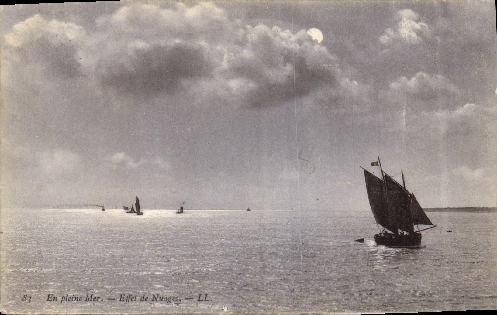 VINTAGE POSTCARD Boat of sin On the open sea Effect of clouds