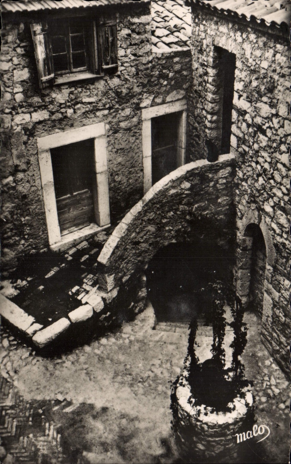 Casa de la mujer mayor de Eze de la POSTAL de la VENDIMIA