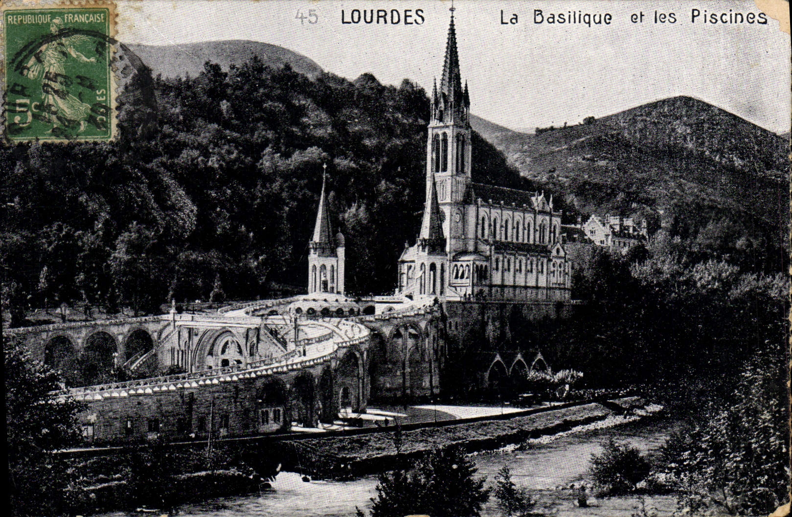 POSTAL de la VENDIMIA pesada la basílica y las piscinas