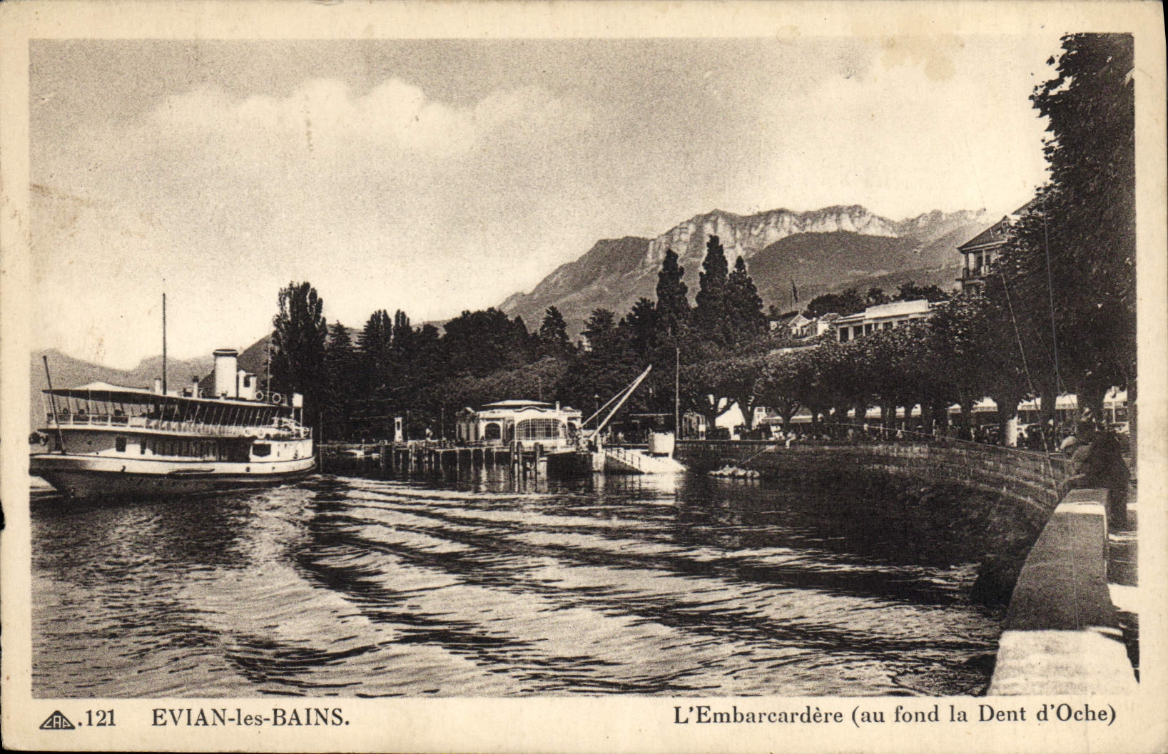 VINTAGE POSTCARD Evian Les Bains Embarcardere At the bottom the tooth of Oche Boat
