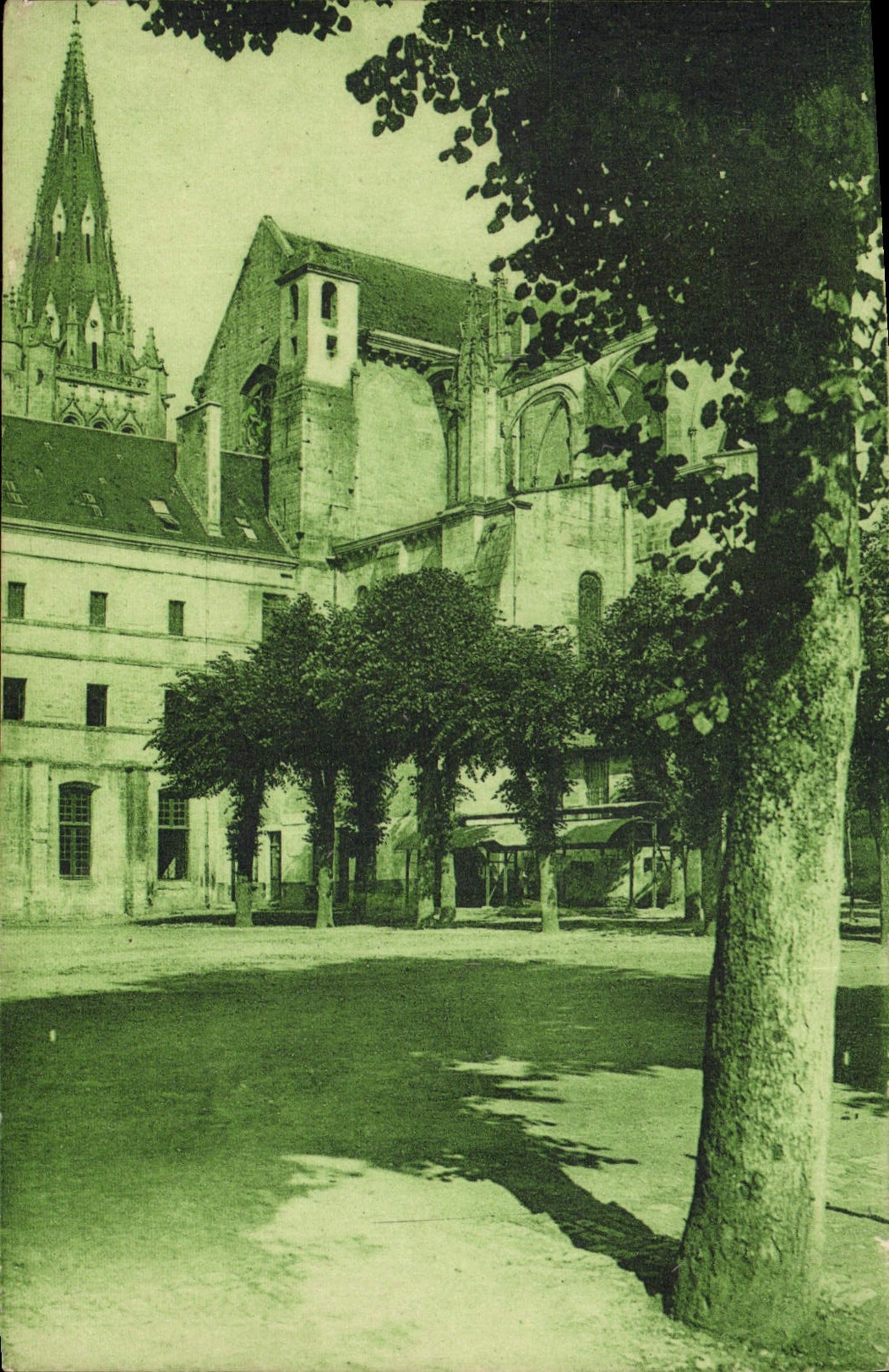 VINTAGE POSTCARD Holy Maixent Barracks Canclaux installee in the adossee abbey with the Gothic church