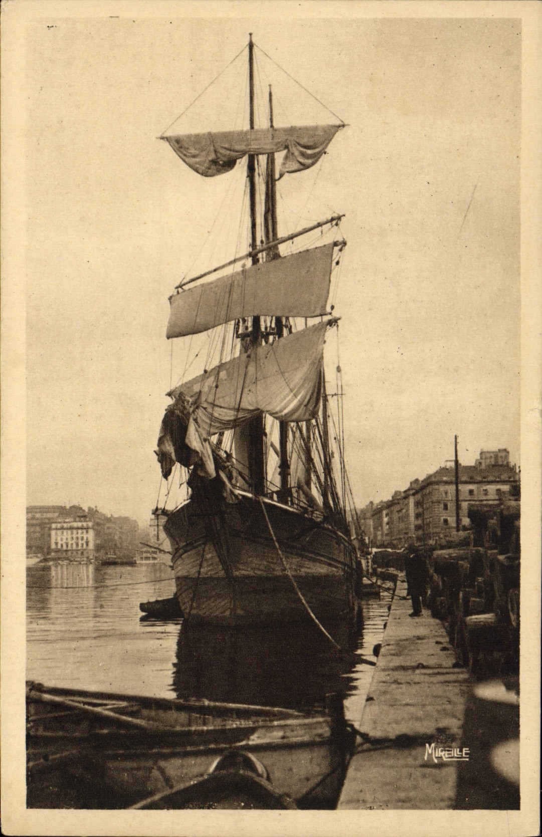 VINTAGE POSTCARD Marseilles Boat a sailing ship in the old port In the distance Canebiere