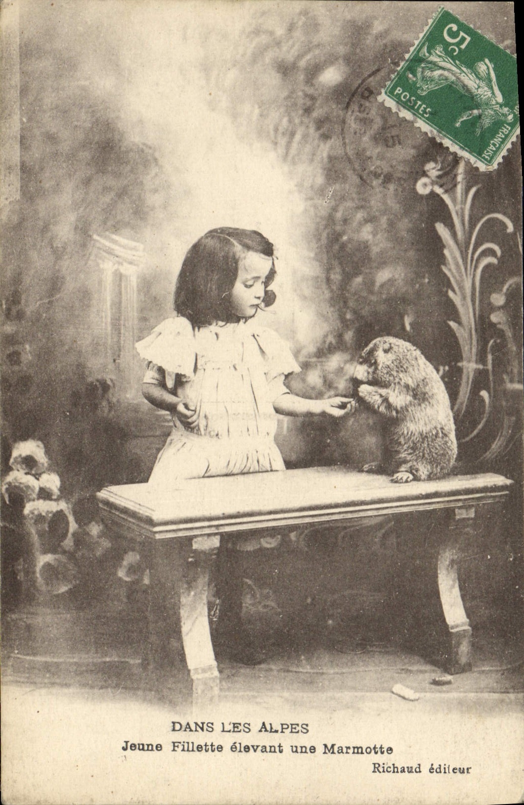 VINTAGE POSTCARD In the Alps Young person young girl raising a marmot TOP