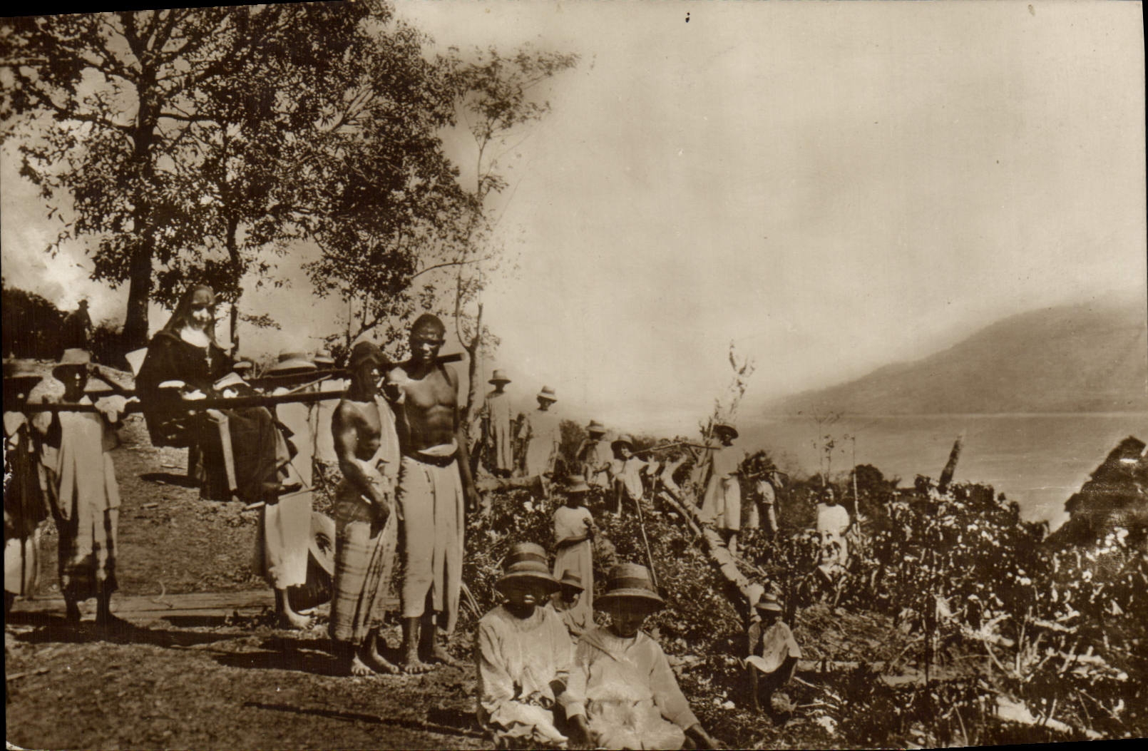 VINTAGE POSTCARD Negro black Man Congregation of Joseph Saint of Cluny Nossi Be In round in a black village Nossi-Be Madagascar