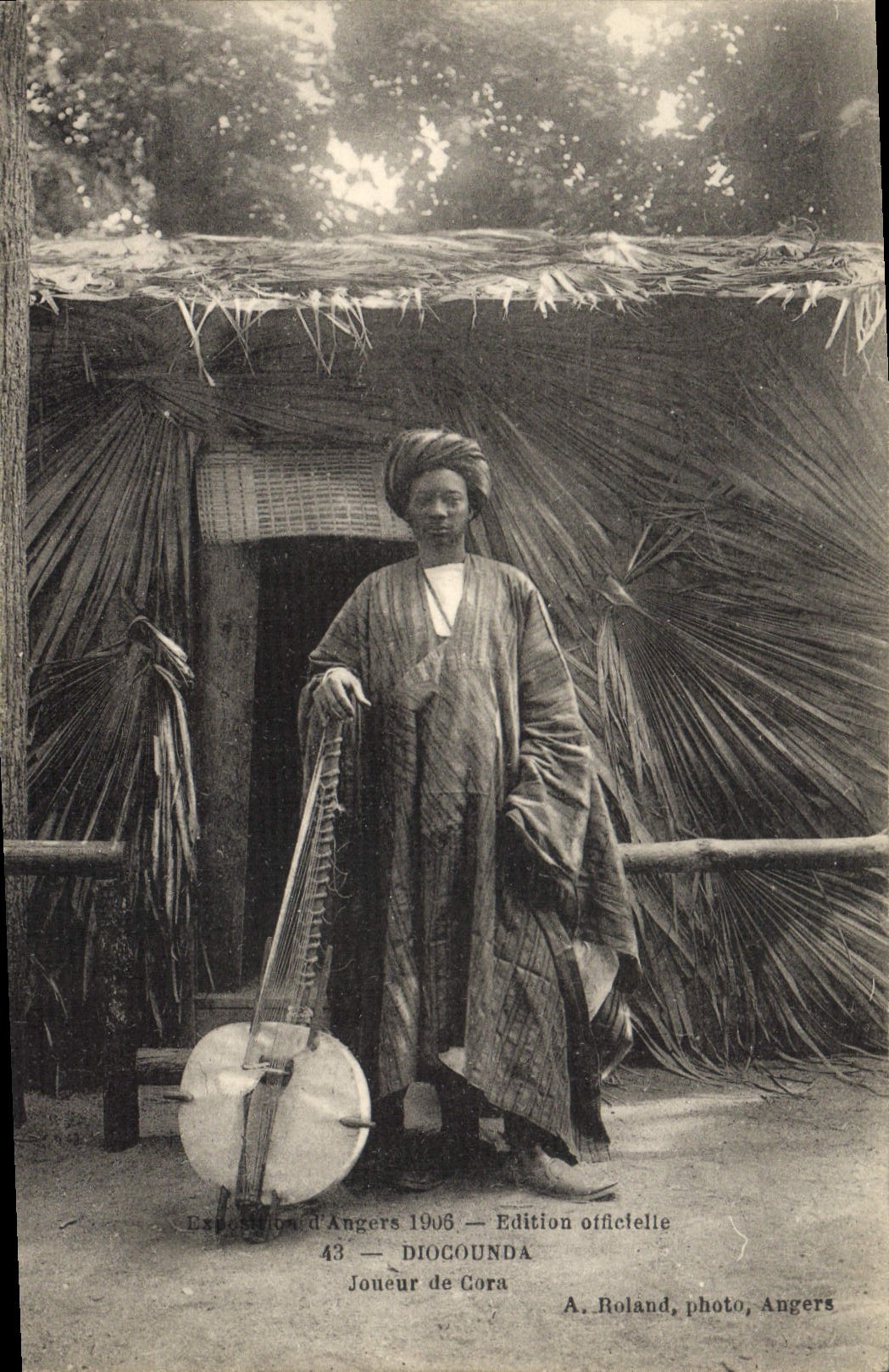 La feria del hombre negro del negro de la POSTAL de la VENDIMIA de encoleriza a jugador 1906 de Diocounda de Cora