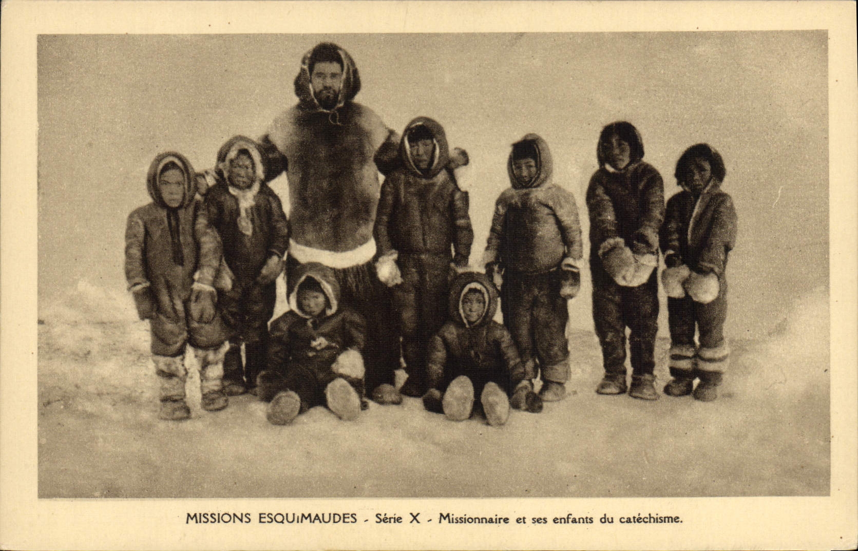 VINTAGE POSTCARD Polar Eskimo Missions Missionary and his children with catechism
