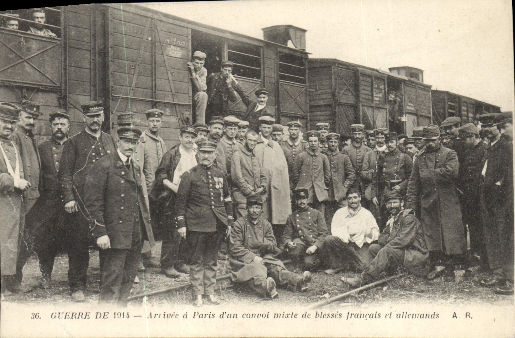 Vintage Postcard Sante Militaria Arrivee has Paris of a mixed convoy of wound French and German