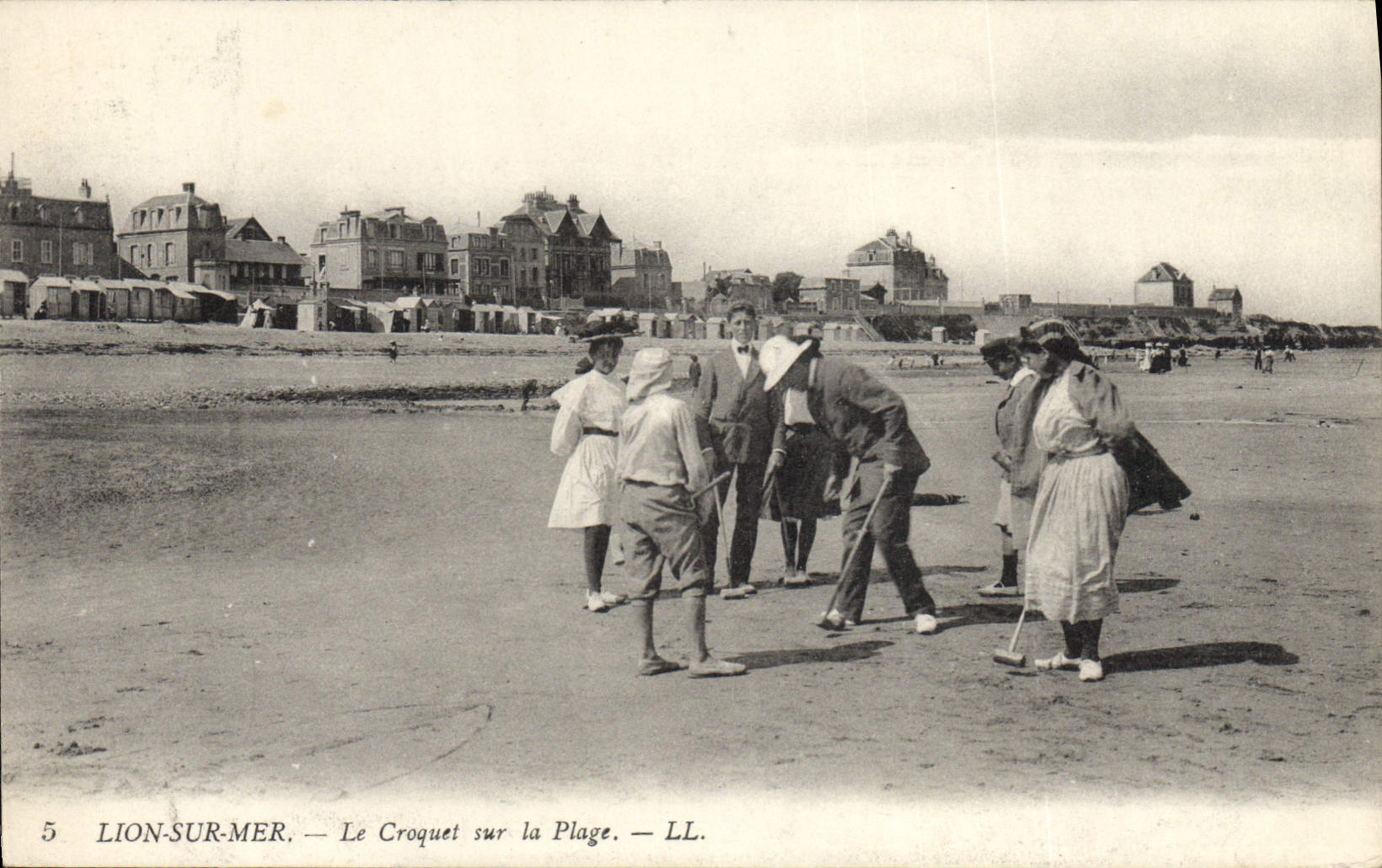 Vintage Postcard Lion on Sea croquet on the beach