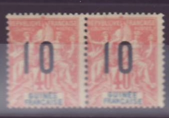Guinee 40c n°53 paire avec chiffres espacees tenant a normal * (tir 906)