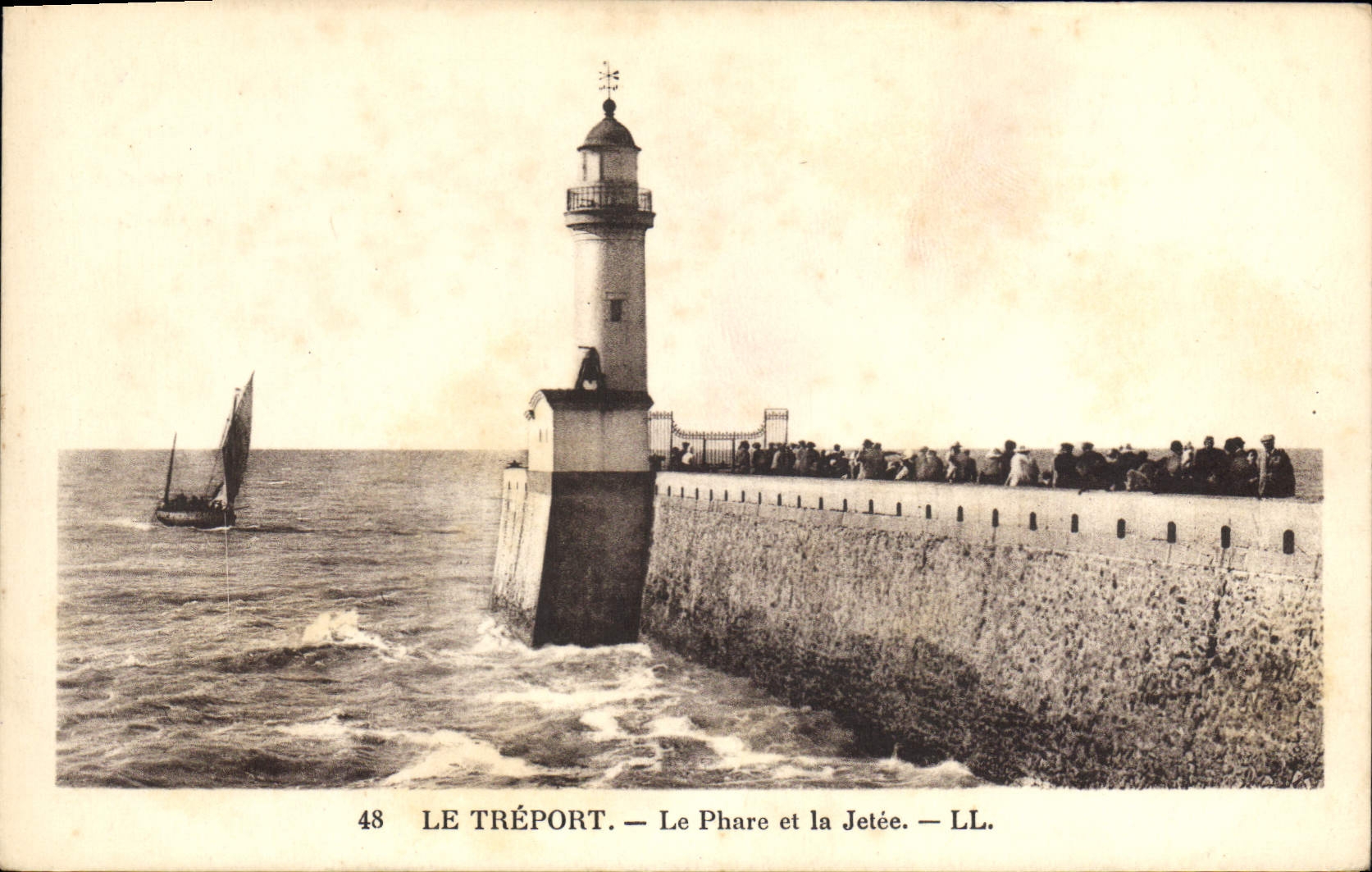 Vintage Postcard Headlight and the pier Treport