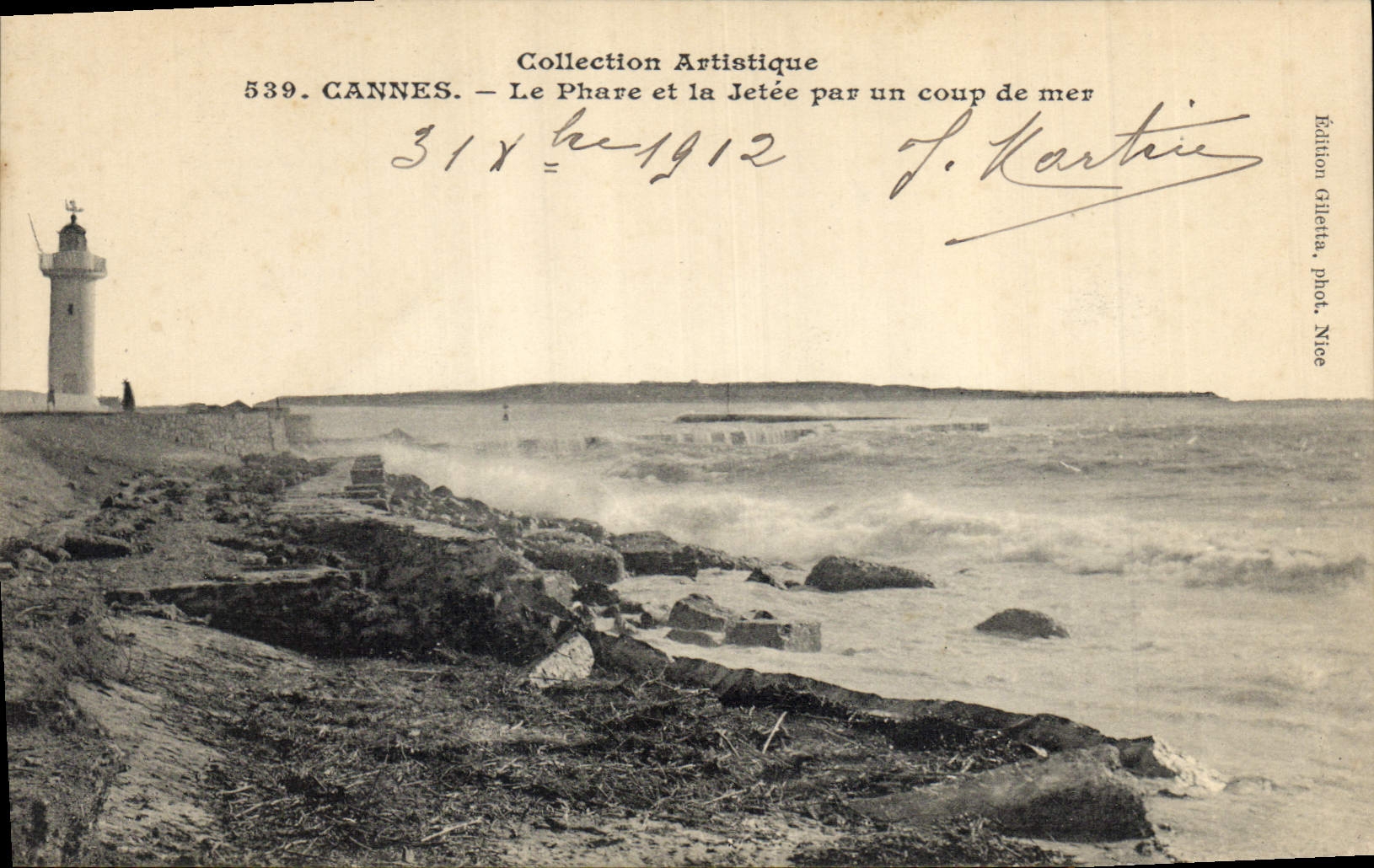 CPA Phare et la jetee par un coup de mer Cannes 