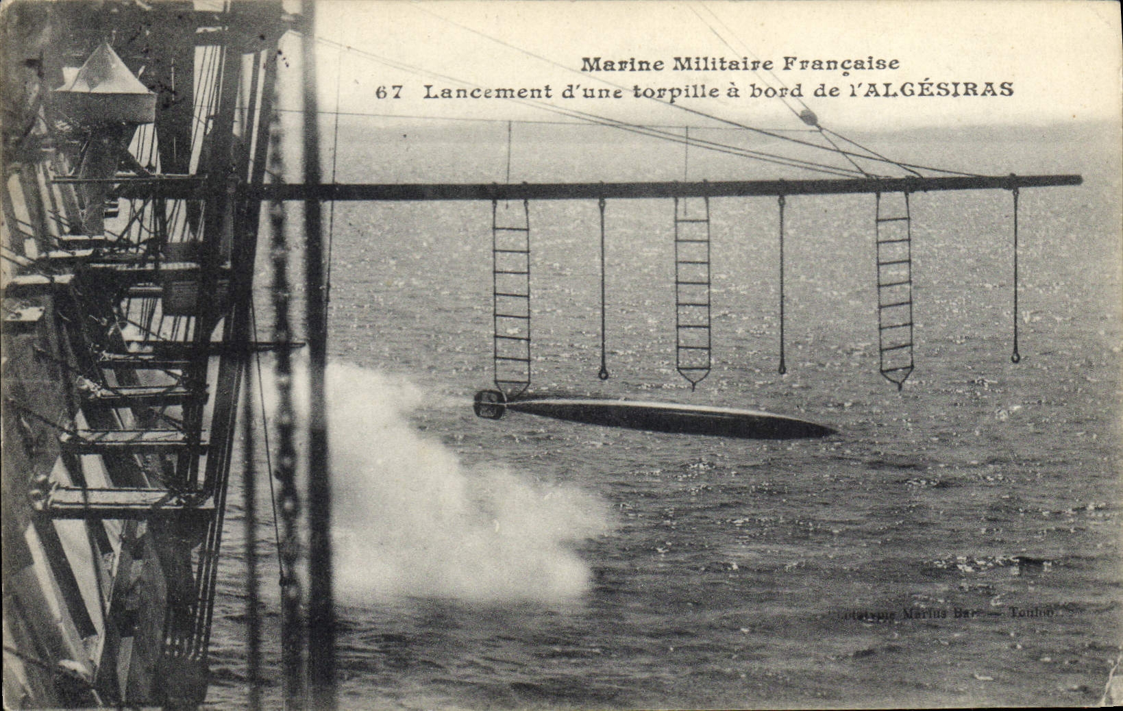 Vintage Postcard Warship Launching of a torpedo has edge of Algeciras