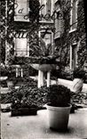 CPA Grand Garage Hotel un des jardins de l'hôtel