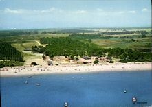 CPSM Aleria Le Site De Casabianda Vue Aerienne De La Plage Et Du Village interministériel