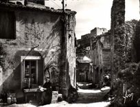 CPSM Les Baux de Provence B du R Rue du Trincot au fond Ruines du Chateau feodal 