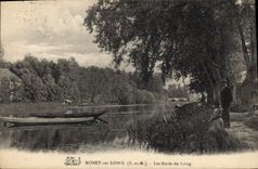 CPA Moret sur Loing S et M Les bords du loing barque promeneurs