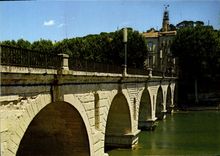 CPM Sommieres La Pont Romain Et La Tour De I'Horloge Sur Le Pont