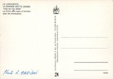 CPSM La Grande Motte La Ville de l'An 2000 Le Point Zero avec a l'arriere plan les immeubles