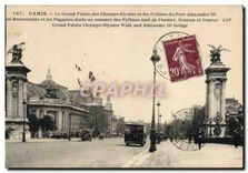 CPA Paris Le Grand Palais des Champs Elysees et les Pylones du Pont Alexandre III 
