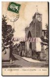 CPA Aigues Mortes L'Eglise et la Grand Rue 