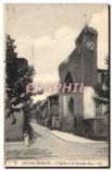 CPA Aigues Mortes L'Eglise et la Grande Rue 