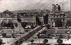 CPA Paris et ses Merveilles La butte Montmartre vue de palais du Louvre 