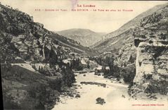 CPA La Lozere Tarn Ste Enimie Le Tarn en aval du Village 
