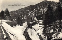CPA L'Auvergne Le Lioran sous la neige Train a vapeur