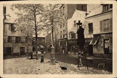 CPA Paris en Flanant Montmartre sous la Neige Place du Tertre et Cabaret de la Mere Catherine 