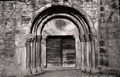 CPM Arreau Htes Pyrenees Portail roman du XIe siecle de la chapelle St Exupere classee monument hist