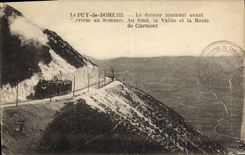 CPA Le Puy de Dome Le dernier tournant avant arrivee au Sommet Au fond la Vallee et la Route de Cler