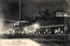CPA Paris Le Grand Palais des Champs Elysees un soir d'illumination 