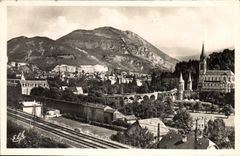 CPA Lourdes Vue generale prise de la Route de Pau 