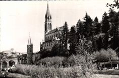 CPA Lourdes H P la Basilique les Piscines et le Chateau Fort 