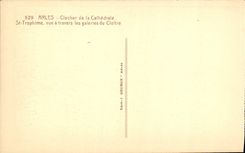 CPA Arles Clocher de la Cathedrale St Trophime vue a travers les galeries du Cloitre 