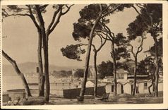 CPA La Douce France Cote d'Azur Juan les Pins Alpes Maritimes La Plage vue a travers les Pins 