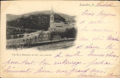 CPA Lourdes Vue de a Basilique de cote avec piscine 
