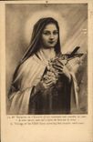 CPA La Bte Therese de l'Enfant Jesus couvrant son crucifix de roses 