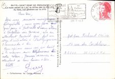 CPM Saint Remy de Provence la route venant du Lac au milieu des Alpilles au fond vue generale sur la