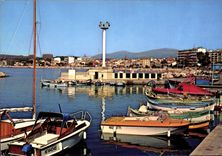 CPM Au Soleil de la Cote d'Azur Cros de Cagnes le Port vue generale de la ville Bateaux