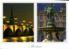 CPM Bordeaux le Pont de Pierre et la Fleche St Mchel la nuit a droite la Fontaine des 3 graces place