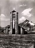 CPM Le Col de l'Iseran La plus haute route d'Europe La chapelle de l'Iseran et l'aiguille de la Gran