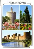 CPM Aigues Mortes Gard la cite de Saint Louis la tour de Constance la statue de St Louis les rempart