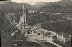 CPA Lourdes Eglise du Rosaire et la Basilique de N D de Lourdes 