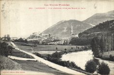 CPA Les Hautes Pyrenees Lourdes Vue generale prise des bords du Gave 