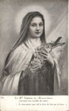 CPA La B Therese de L'Enfant Jesus couvrant son crucifix de roses 